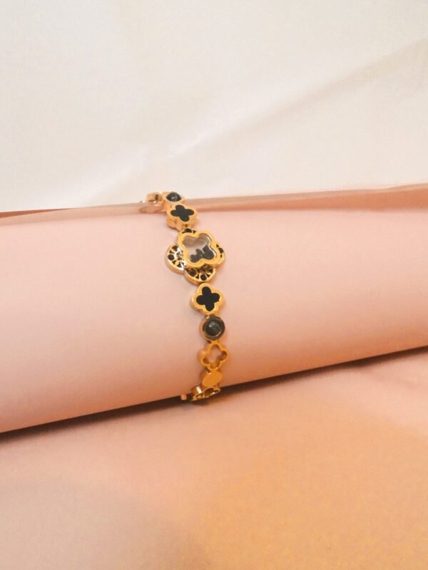 Clover design black stud bracelet
