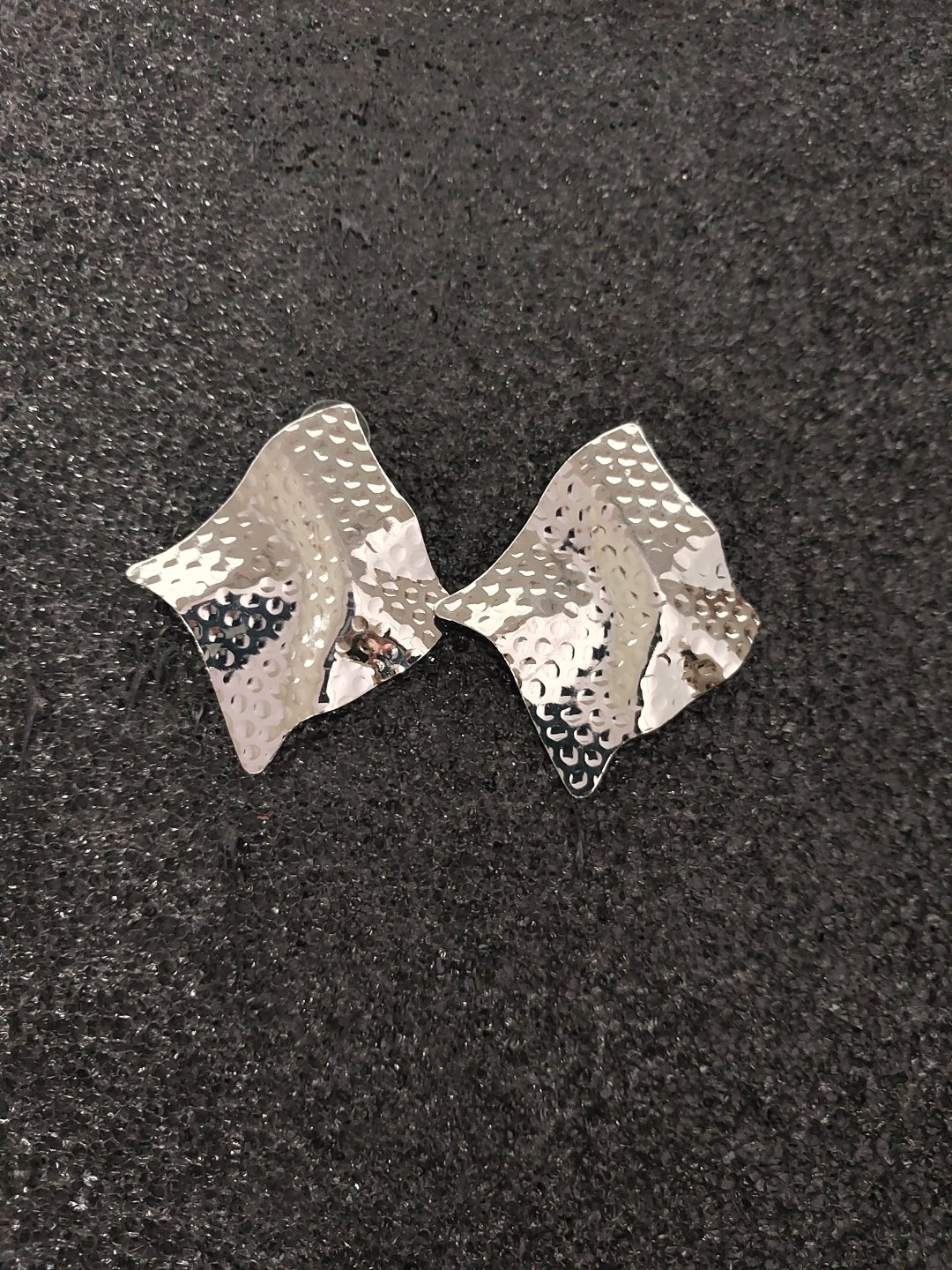 Textured wrinkle dangles